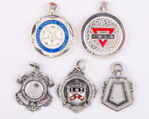 Five silver medals, including B.A.F.U. Junior League runners-up 1923-24 medal