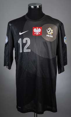 Wojciech Szcesny Black Poland no.12 jersey from the 2014 World Cup Qualifiers,
 Player issued long sleeved jersey that has had the arms cut down to ma