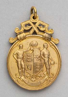F.A. Cup specimen winner's medal,
 stuck in gilt-metal and originally produced for the Football Association to approve the design before the Cup winne