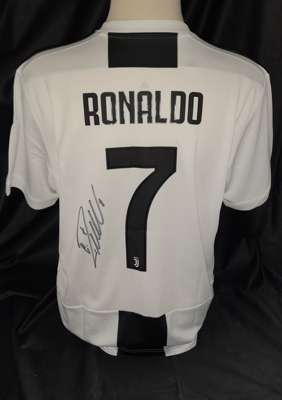 Cristiano Ronaldo signed black and white striped Juventus no.7 replica home jersey, season 2018-19, 
 brand new with tags still attached, Cristiano ha