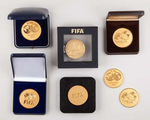 Seven yellow-metal FIFA Congress medals, 1988 to 2015