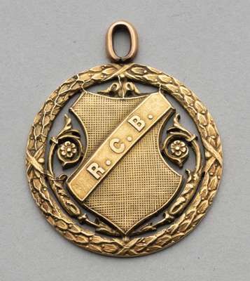 Continental gold football medal for the Coupe Henri de Decker won by a Racing Club de Bruxelles player in 1910, 
 inscribed R.C.B. and with the compet