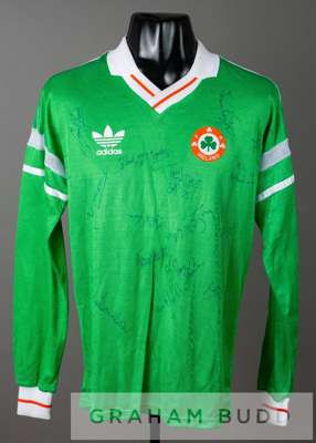 Squad signed green Republic of Ireland no.11 home jersey, circa 1988,
 by Adidas, long-sleeved with FA IRELAND country badge and sponsor logo, reverse