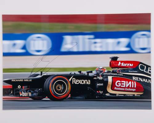 Three Kimi Raikkonen Signed Lotus F1 Team Large Photos