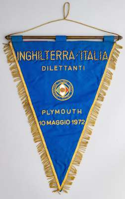 Italian F.A. pennant for the Amateur International match v England, played at Home Park, Plymouth, 10th May 1972,
 gilt wirework embroidered on a blue