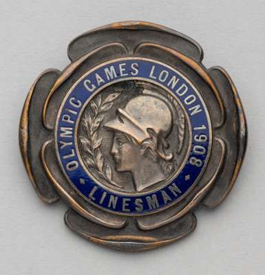 London 1908 Olympic Games Linesman badge,
 the silvered bronze badge featuring the head of Athena surrounded by OLYMPIC GAMES LONDON 1908 LINESMAN in 