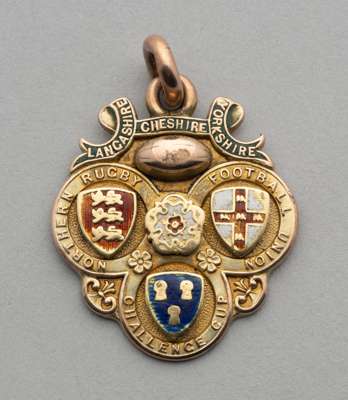 A 9ct gold and enamel Rugby League Challenge Cup Medal, 1898-99, 
 the obverse inscribed Lancashire, Cheshire, Yorkshire, Northern Rugby Football Unio