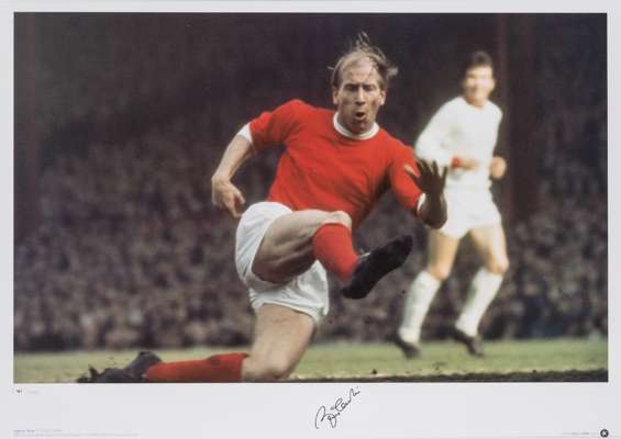 Legend Series Bobby Charlton signed colour photographic print,
 featuring Bobby Charlton in action on the football pitch, signed in fine black marker 