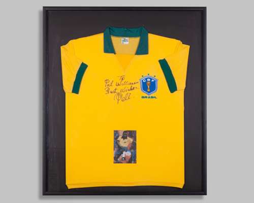 Pele autographed yellow and green Brazil replica short-sleeved shirt display