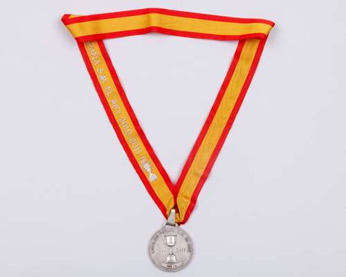 A white-metal Barcelona Copa Del Rey 2010-2011 Runner-ups medal