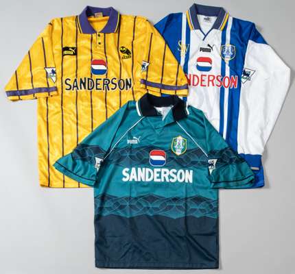 Three Sheffield Wednesday Premier League match jerseys,
 comprising Des Walker amber and purple no.7 away jersey and two John Sheridan blue and white 