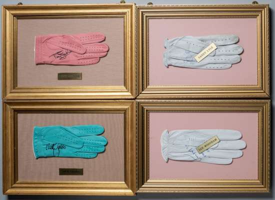 Four British Major winner's signed golf gloves,
 each glove mounted, glazed and framed with engraved players name, signed in blue pen and black marker