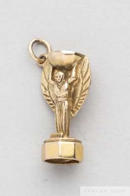 9ct. gold charm in the form of the Jules Rimet Trophy a souvenir of the 1966 World Cup