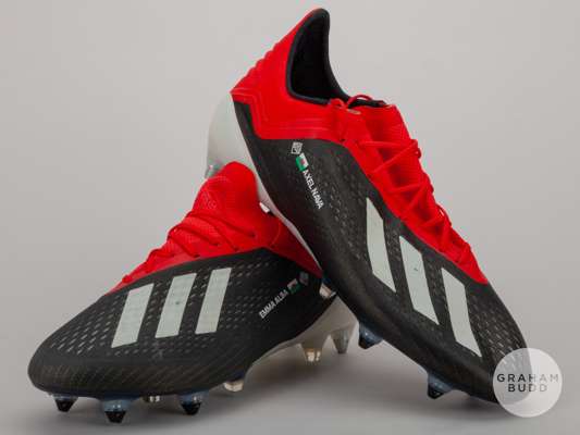 A pair of Gareth Bale red & black Adidas X18.1 football boots.