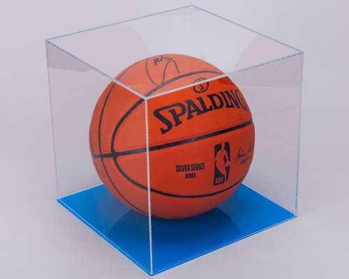 Steph Curry autographed orange and black Spalding Silver Series basketball display