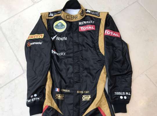 Romain Grosjean 2012 promotional Team Lotus OMP racesuit,  

We are delighted to offer this genuine replica/ promo race suit made by OMP of Italy for 