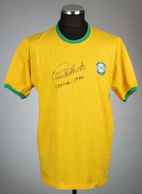 Two Brazilian legends signed jerseys,
 comprising Carlos Alberto signed yellow Brazil retro jersey, short-sleeved with national emblem badge, un-numbe