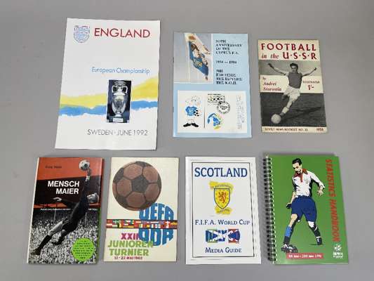 Substantial box of mainly Foreign publications, booklets, etc., 
 together with F.A. publications, Euro '96 and varies FIFA reports, etc., includes go