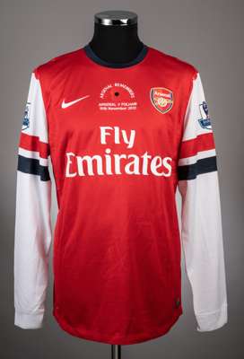 Per Mertesacker red Arsenal no.4 jersey 2012-13 season from the game v Fulham that took place on 10/11/12 at the Emirates stadium,
 Player issue Nike 