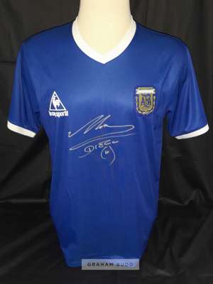 Maradona signed replica of the 1986 World Cup “THE HAND OF GOD” jersey against England, 
 autographed to front by arguably one of the World's greatest