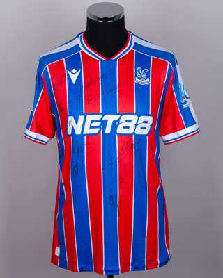 Red and blue Crystal Palace v. AEK Larnaca match issued squad signed shirt