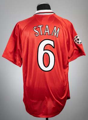 Jaap Stam red Manchester United no.6 home jersey, season 1999-2000,
 Umbro, short-sleeved with UEFA STARBALL sleeve badge, club crest and embroidered 
