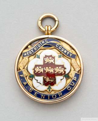 Tom Wilson 9ct gold and enamel 1929-30 West Riding County F.A. Senior Cup medal
 the obverse inscribed 1929-30 WEST RIDING COUNTY F.A. SENIOR CUP, wit