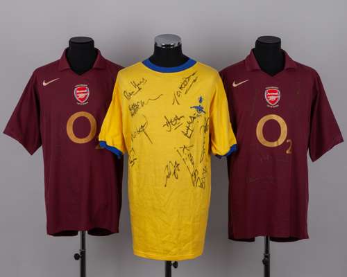 Four autographed Arsenal charity-match shirts