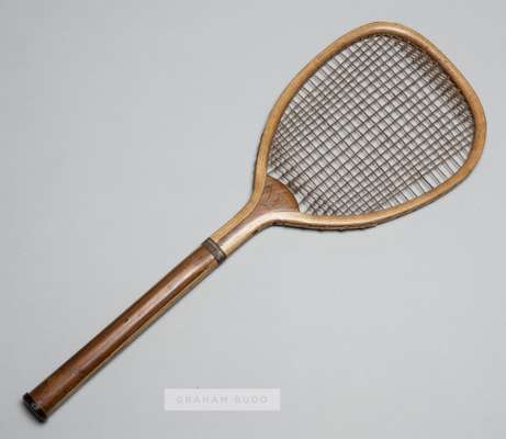 An early flat topped lawn tennis racquet by William et Cie, circa 1885,
 with copper collar and small rounded handle, with early Williams logo stamped