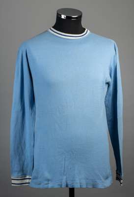 Sky blue Coventry City jersey, late 1960s,
 Umbro, un-numbered, long-sleeved, blue hooped crew neck collar and cuffs 

 Stains to front