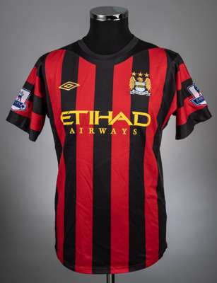 Gael Clichy red and black No.22 Manchester City match worn short-sleeved jersey 2011-12, 
 Umbro, 38, with crew-neck collar and embroidered badge insc