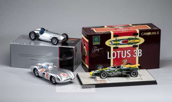Four classic F1 1:18 scale Model Cars,
 CLK AMG F1 safety car, Mercedes Benz  W165 1939 , CMR 066 Mercedes Benz W196 Fangio 1954, Carousel Lotus 38 19