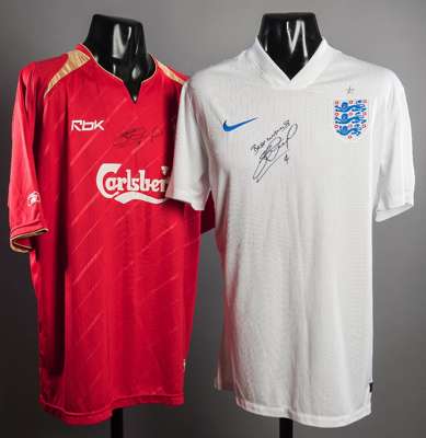 Steven Gerrard signed England and Liverpool replica jerseys, both signed to the front in black marker pen (2)