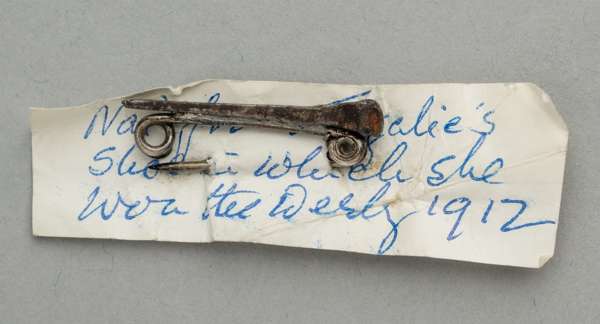 A nail from the shoe of the filly Tagalie when she won the Epsom Derby 5th June 1912,
 the nail engraved with the dated 5 - 6 - 12 and converted into 