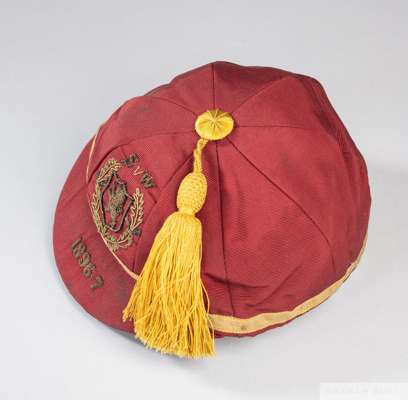 Red Scotland v. Wales International cap, 1896-97
 the red velvet cap with yellow thread tassel and gilt braiding, embroidered with Scotland crest and 
