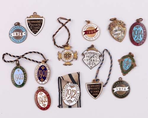 14 Newmarket Racecourse members' badges dating between 1894 and 1918