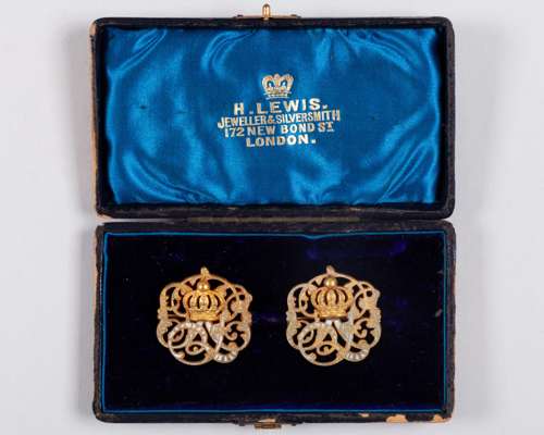 A cased pair of 1886 Sandown Park members' badges