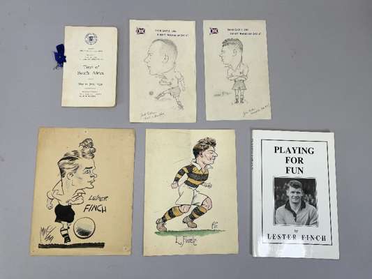 Lester Finch includes itinerary for FA tour to South Africa 1939, 
 luggage label, and Finch as artists own caricatures drawings of members of FA squa