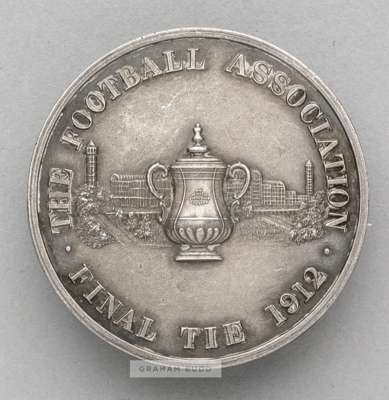 1912 F.A. Cup Final badge issued to the F.A. official Charles James Hughes (1853-1916),
 in hallmarked silver London 1911, designed with the FA Cup tr