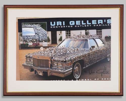 Uri Geller's Contorted Cutlery Cadillac Framed Print