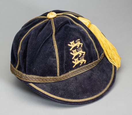 England Schools' F.A. representative cap,
 navy velvet with yellow tassel and gilt braiding, embroidered with England three lion crest, sold together 