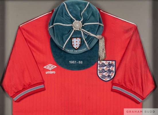 Neil Webb: cap and shirt for the 1,000th footballer to play for England,
 a framed & glazed display housing Neil Webb's debut England cap and match-wo