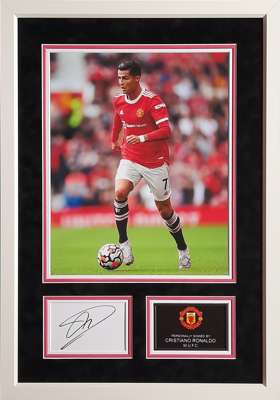 Cristiano Ronaldo Manchester United signed framed large photo card and plaque display, 
 measuring 71 by 50cm., autograph of Ronaldo is his shortened 