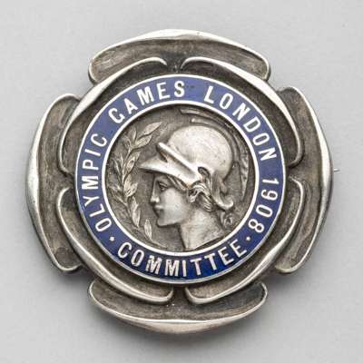 London 1908 Olympic Games Committee member's badge,
 silvered bronze and blue enamel with central head of Anthea surrounded by OLYMPIC GAMES LONDON 19