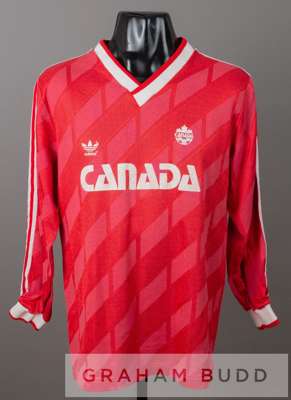 Red Canada no.12 substitute's jersey, circa 1986,
 by Adidas, long-sleeved with country crest and sponsor logo, reverse numbered 12, slightly faded

 