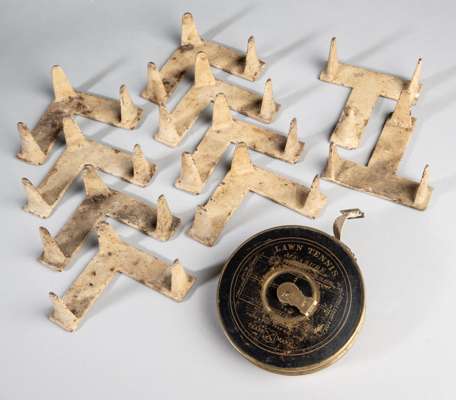 A set of ten grass court lawn tennis markers by F.H. Ayres of London,
 10 by 10cm, eight corner markers and two T's, sold together with a brass lawn t