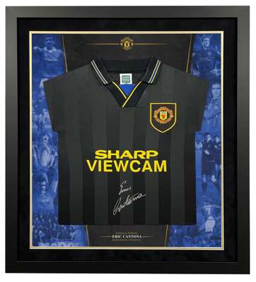 Manchester United Eric Cantona signed & framed black away retro jersey as worn when he administered his Kung-Fu kick upon Matthew Simmons who'd launch