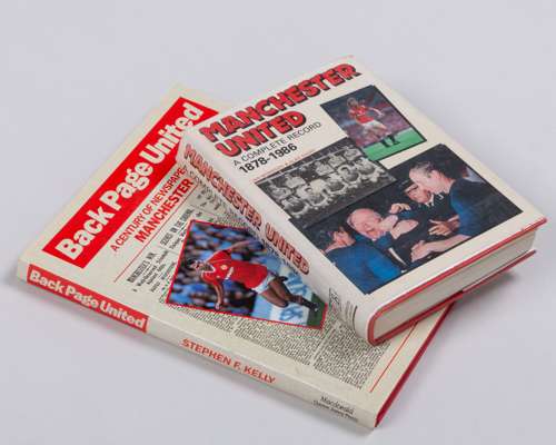 Manchester United A Complete Record 1878-1986 book with multiple attached autographs