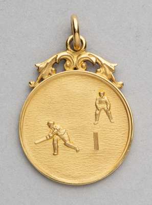 The Evening News Cricket Cup for Footballers winner's medal awarded to Jimmy Skinner of Tottenham Hotspur in 1926,
 obverse decorated with cricketers,