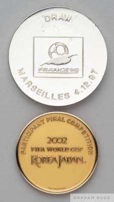 Two cased FIFA World Cup medals, the first for the draw for the 1998 World Cup